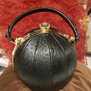 Ostrich print round satchel